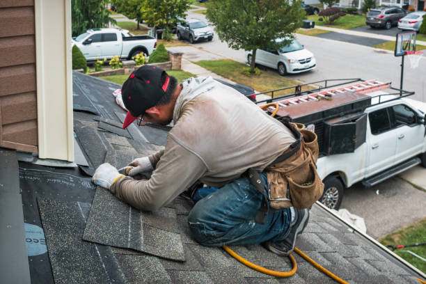 Professional Flat Roof Repair technician working in Cost, TX